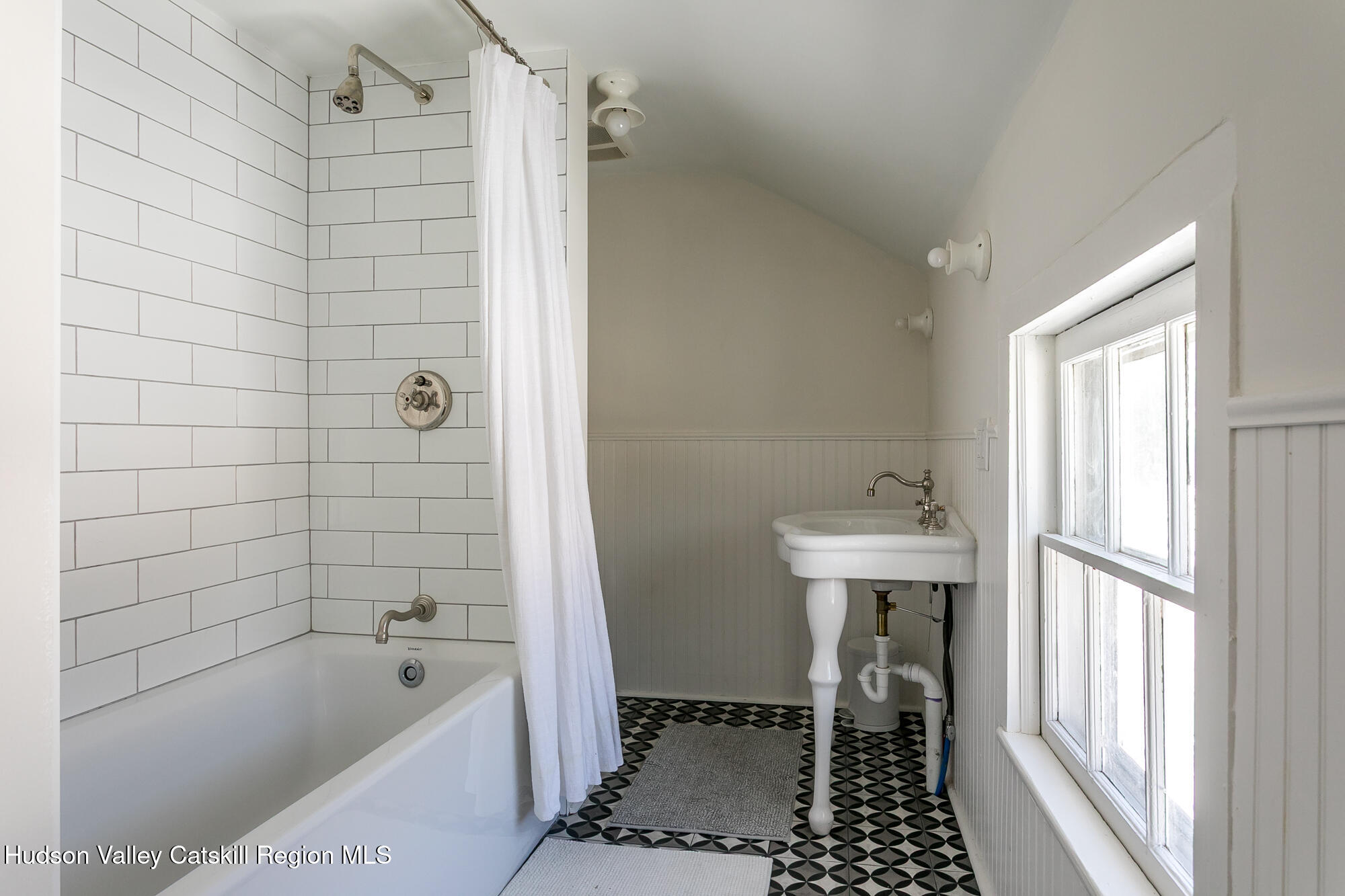 8 George Sickle Road Saugerties, NY 12477 - Photo 25 of 26 a bathroom with a bathtub a sink a toilet and a window