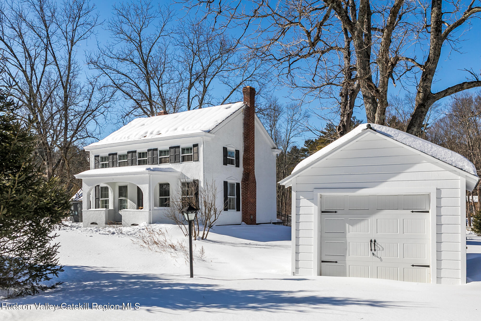 8 George Sickle Road Saugerties, NY 12477 - Photo 3 of 26 a view of a white house with a large tree