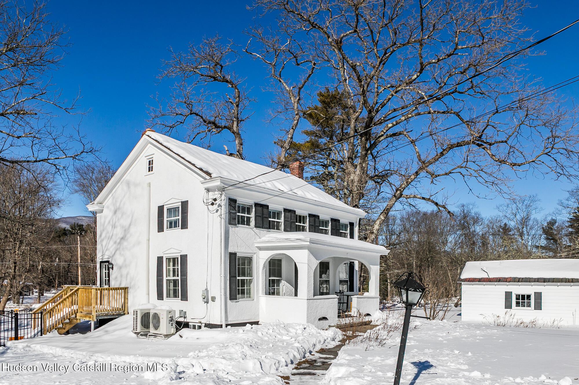 8 George Sickle Road Saugerties, NY 12477 - Photo 4 of 26 a front view of a building with large trees