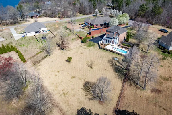 a view of swimming pool with outdoor seating