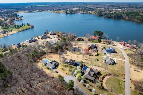 an aerial view of houses with outdoor space
