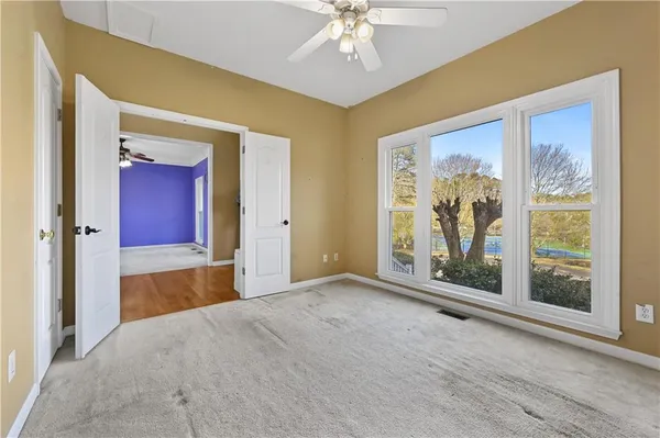 a open kitchen with stainless steel appliances granite countertop a stove and a refrigerator