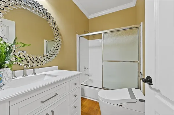a kitchen with stainless steel appliances granite countertop a stove and a refrigerator