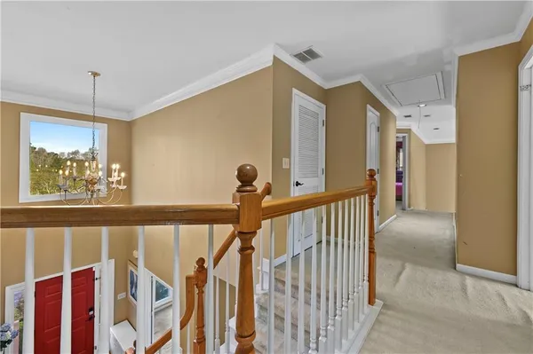 a room with furniture and ceiling fan