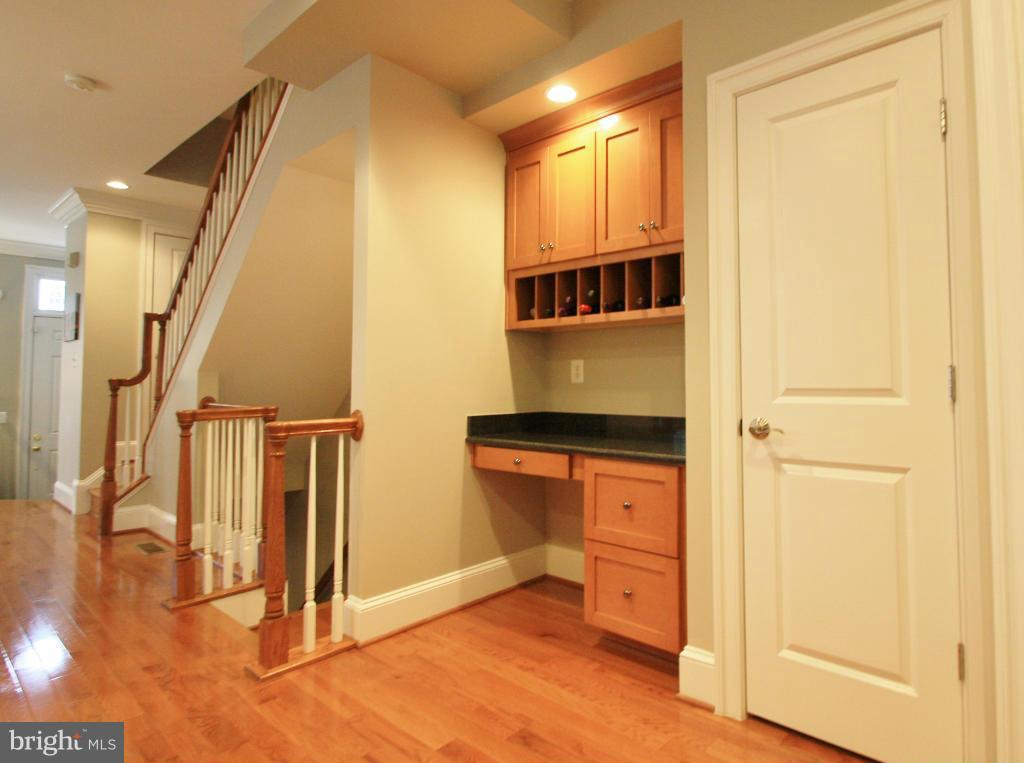 413 Princess Street Alexandria, VA 22314 - Photo 10 of 30 Fitted desk, wine rack and pantry in kitchen