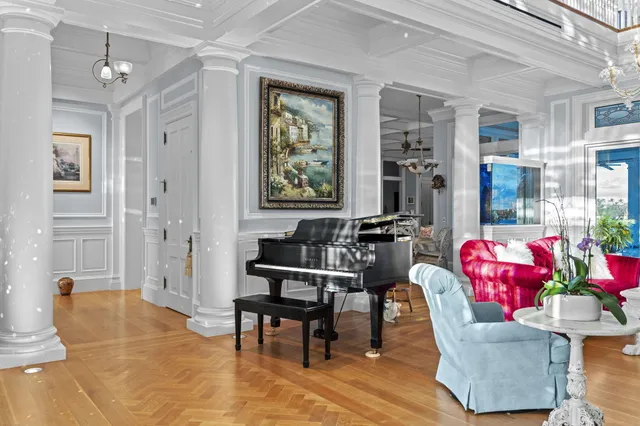 a view of entryway with wooden floor and stairs