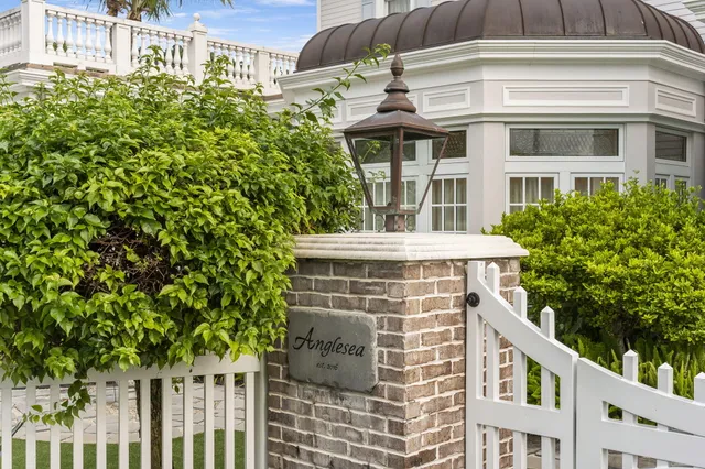 a kitchen with a sink cabinets and a large window
