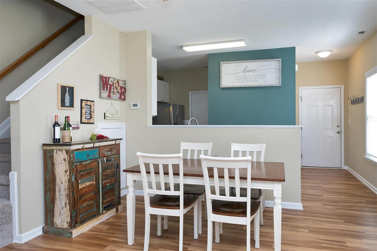 2049 Persimmon Ridge Drive Raleigh, NC 27604 - Photo 5 of 15 You'll enjoy dining on meals prepared in your wonderful kitchen. Notice how the dining area is open to the kitchen, providing a great flow for serving food and entertaining. Dining