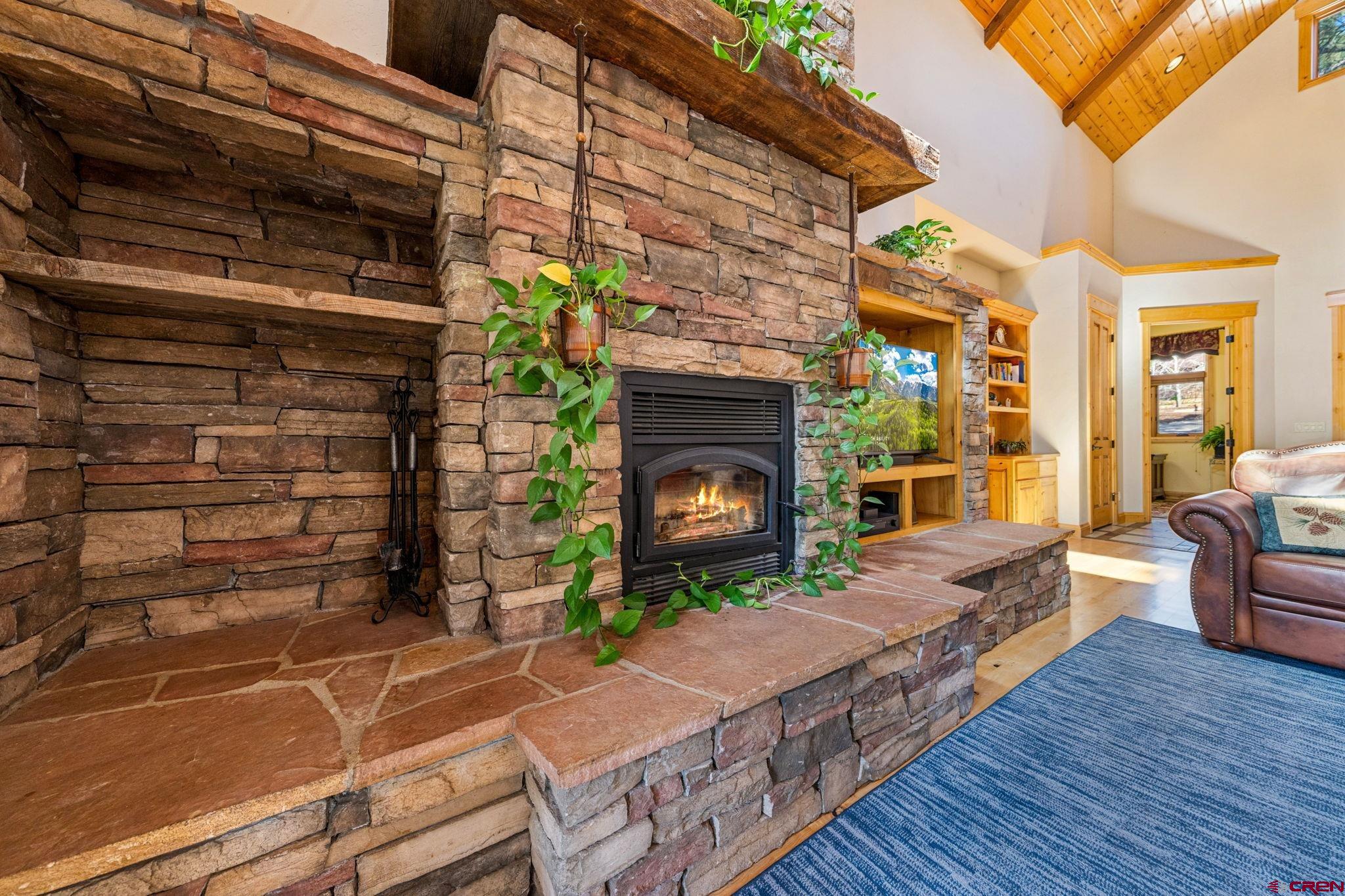 70 Clear Creek Loop Durango, CO 81301 - Photo 4 of 35 a living room with furniture and a fireplace