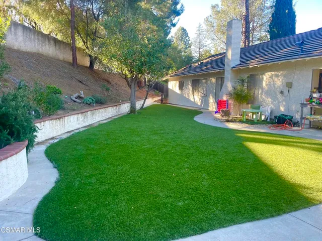 a couple of table and chairs in the patio