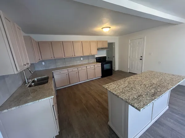 a utility room with cabinets