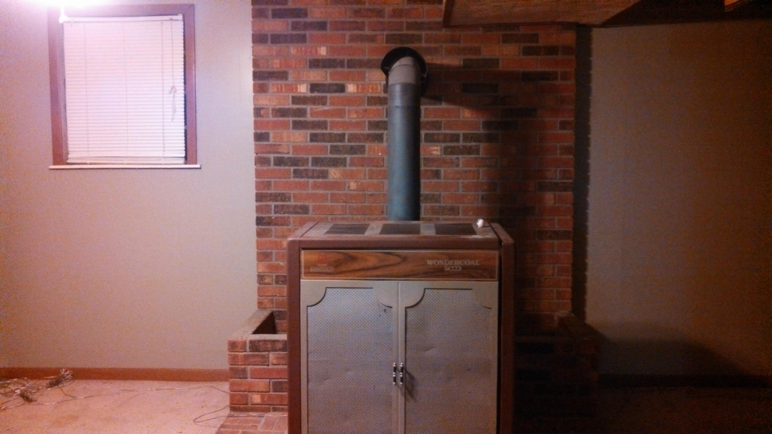 192 Williams Road Philadelphia, TN 37846 - Photo 9 of 17 Downstairs Den with wood stove included
