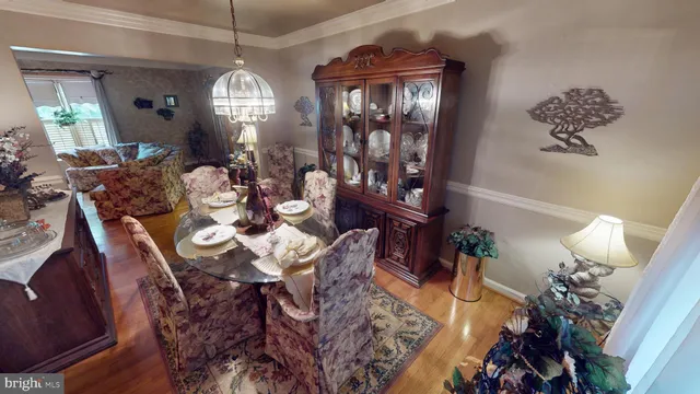 a reading room with furniture a window and a fireplace