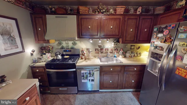 a view of a livingroom with furniture and front door
