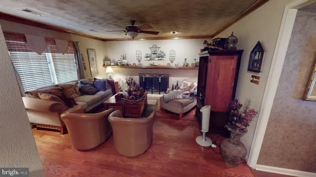 a living room with furniture and a table
