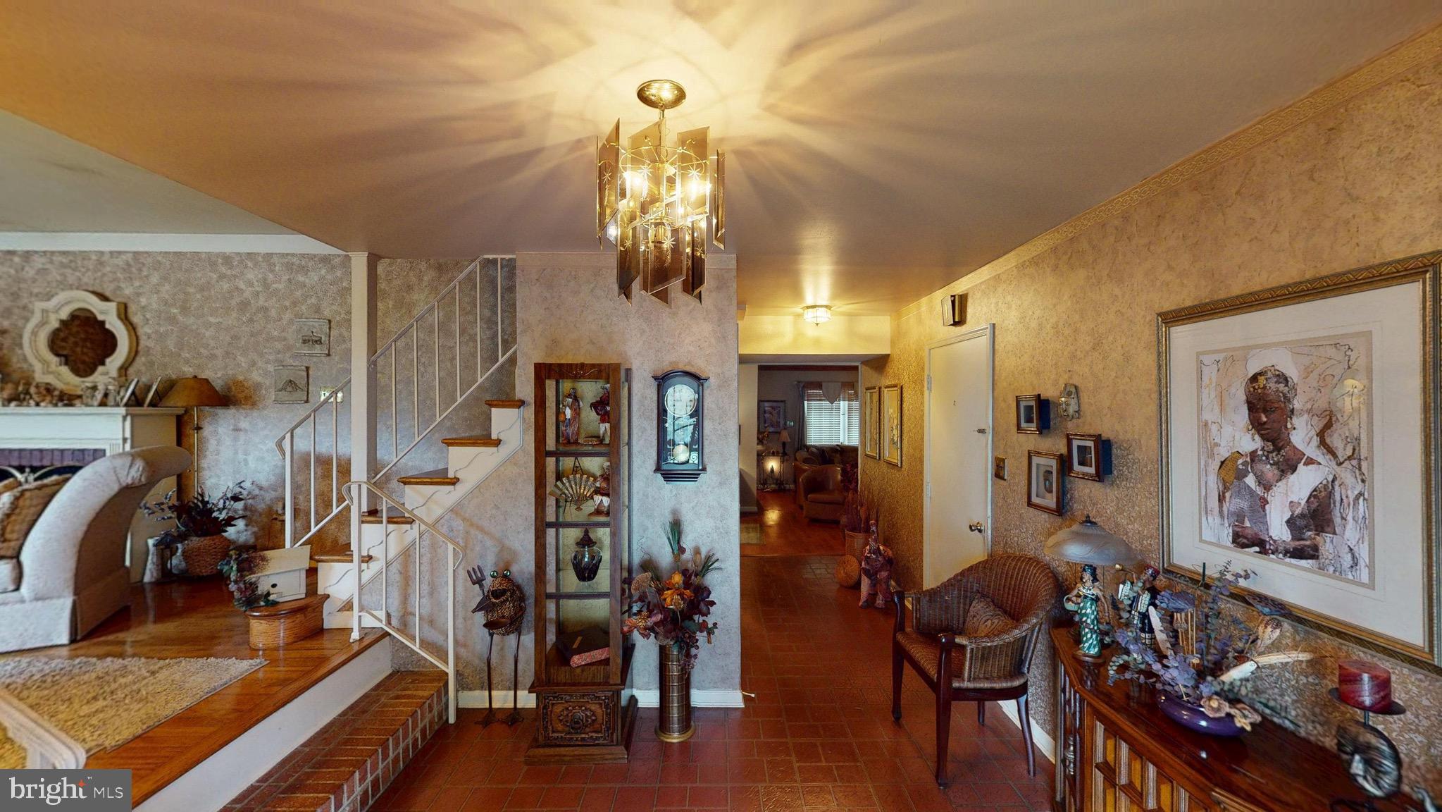 6911 Good Luck Road Hyattsville, MD 20784 - Photo 3 of 94 a view of a room with gym equipment