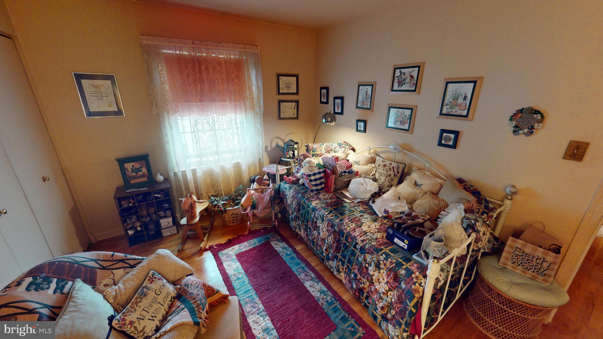 6911 Good Luck Road Hyattsville, MD 20784 - Photo 52 of 94 a bed room with a bed and a window