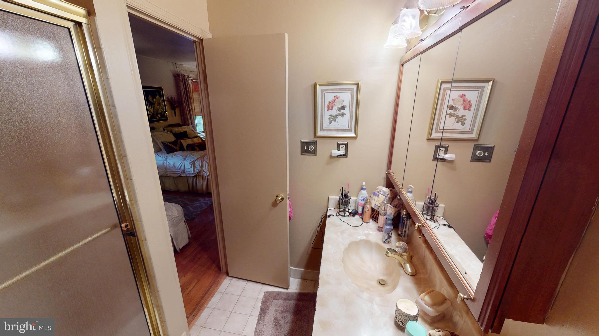 6911 Good Luck Road Hyattsville, MD 20784 - Photo 67 of 94 a view of a hallway with furniture and closet