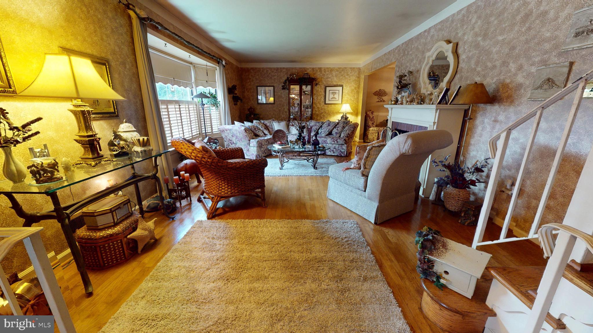 6911 Good Luck Road Hyattsville, MD 20784 - Photo 7 of 94 a view of a livingroom with furniture and a couch