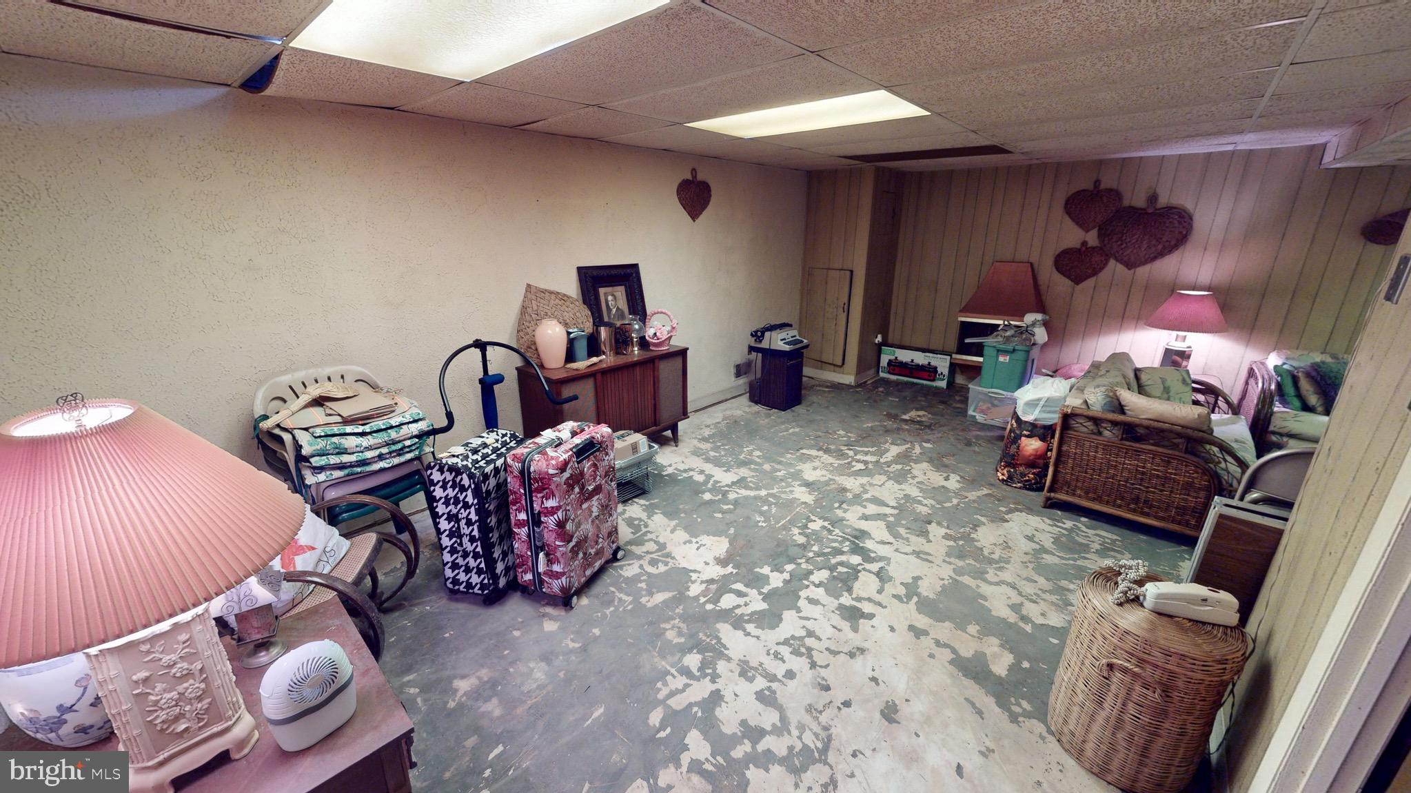 6911 Good Luck Road Hyattsville, MD 20784 - Photo 71 of 94 a bedroom with furniture and a lamp