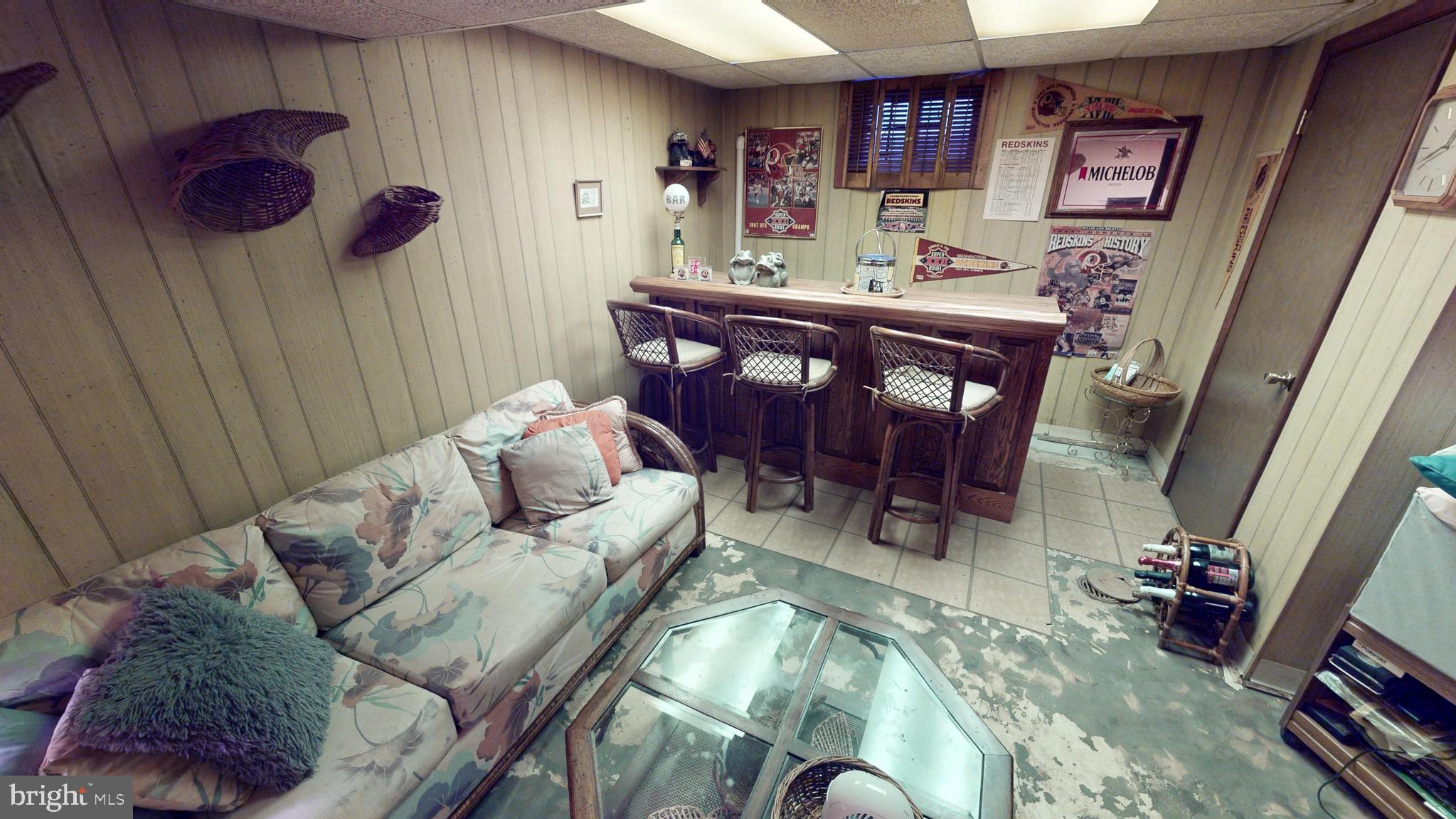 6911 Good Luck Road Hyattsville, MD 20784 - Photo 74 of 94 a living room with furniture and wooden floor