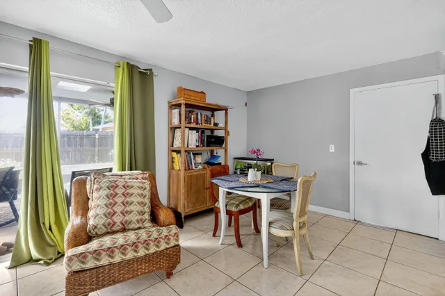 a workspace with furniture and a window