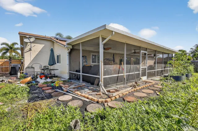 a house view with a garden space
