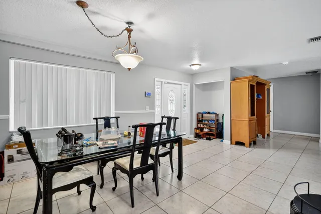 a view of a livingroom and dining room