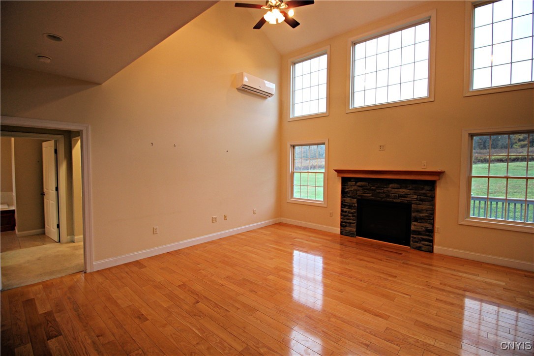 7587 Hamilton Road Hamilton, NY 13346 - Photo 17 of 37 Family room with cathedral ceiling