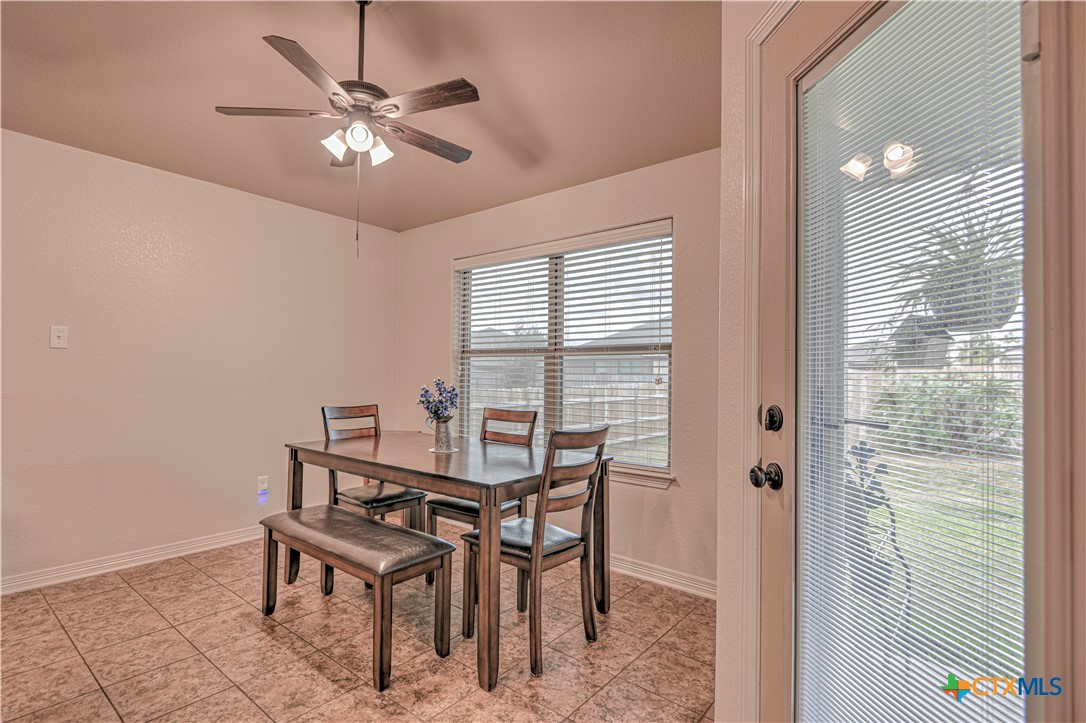 8405 Split Trl Cove Temple, TX 76502 - Photo 12 of 37 a view of a dining room with furniture and a window