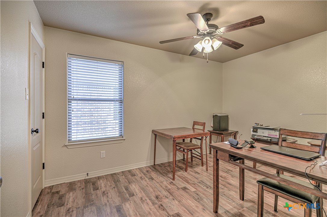 8405 Split Trl Cove Temple, TX 76502 - Photo 26 of 37 a workspace with chandelier