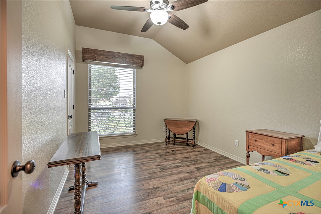 8405 Split Trl Cove Temple, TX 76502 - Photo 28 of 37 a bedroom with a bed and a window