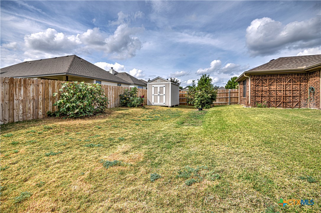 8405 Split Trl Cove Temple, TX 76502 - Photo 33 of 37 a view of a house with a yard and potted plants