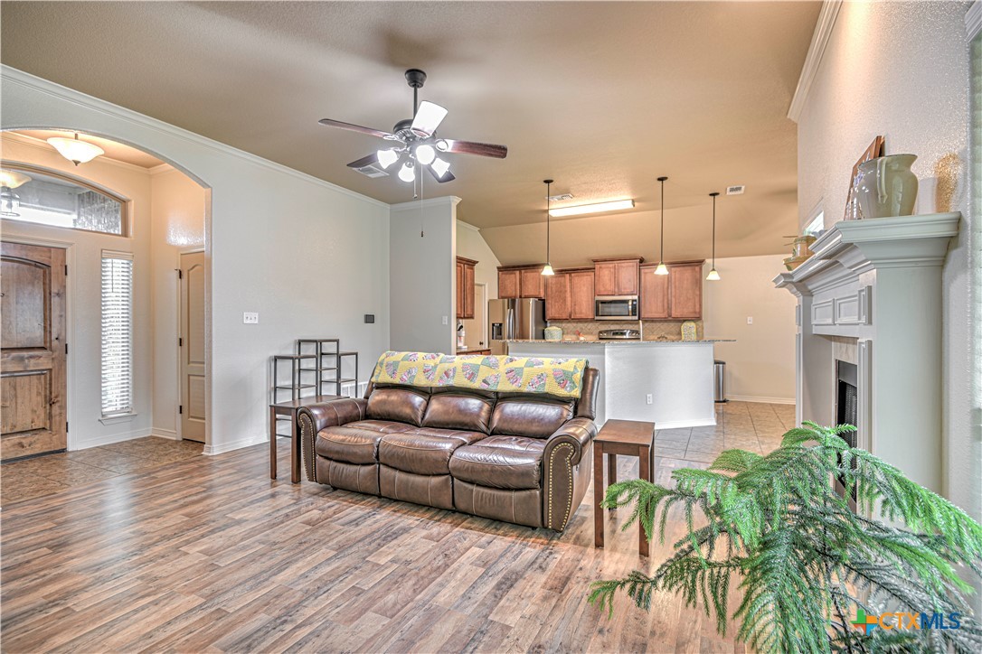 8405 Split Trl Cove Temple, TX 76502 - Photo 8 of 37 a living room with furniture and a wooden floor