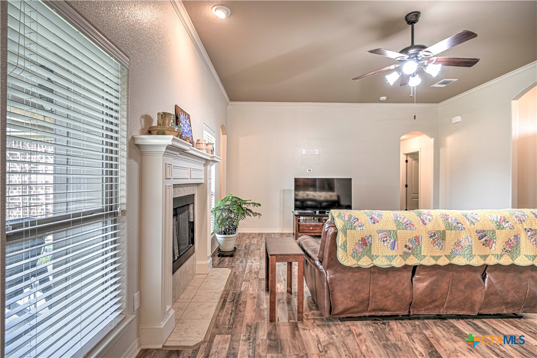 8405 Split Trl Cove Temple, TX 76502 - Photo 9 of 37 a living room with furniture and a fireplace