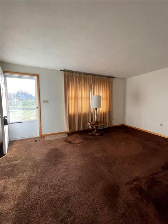 1409 Mission Road Latrobe, PA 15650 - Photo 5 of 8 an empty room with windows