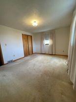 1409 Mission Road Latrobe, PA 15650 - Photo 7 of 8 a view of an empty room with a window