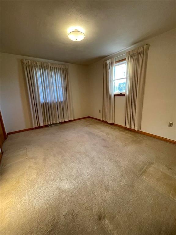 1409 Mission Road Latrobe, PA 15650 - Photo 8 of 8 an empty room with windows