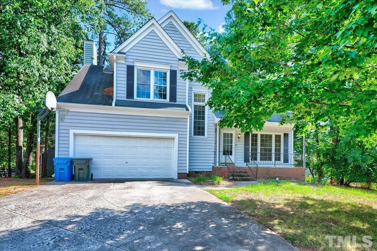 4003 Kettering Drive Durham, NC 27713 - Photo 1 of 28 front view of a house with a yard and garage
