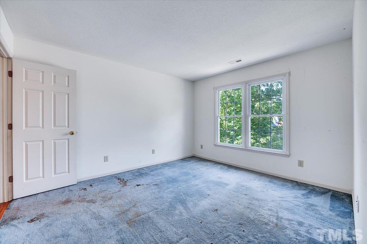 4003 Kettering Drive Durham, NC 27713 - Photo 17 of 28 an empty room with a window