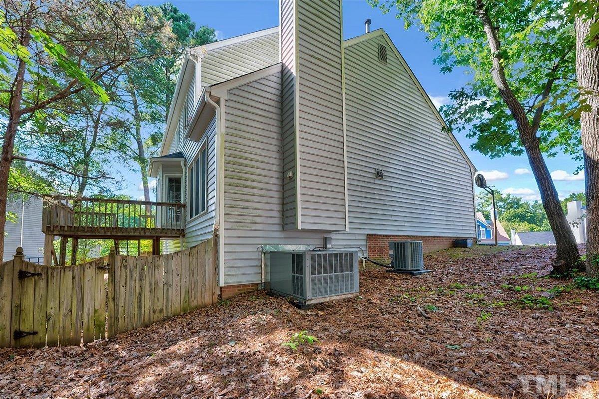 4003 Kettering Drive Durham, NC 27713 - Photo 24 of 28 a view of a house with a yard and large tree
