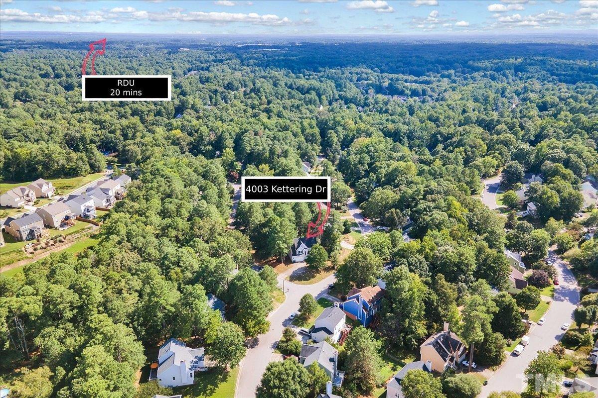 4003 Kettering Drive Durham, NC 27713 - Photo 25 of 28 a view of a house with a yard and street