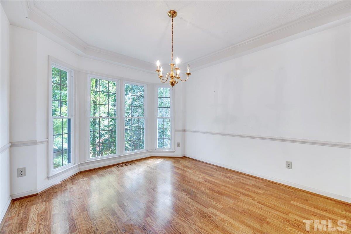 4003 Kettering Drive Durham, NC 27713 - Photo 5 of 28 a view of a room with window wooden floor and front door