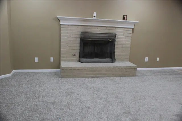 a living room with a fireplace