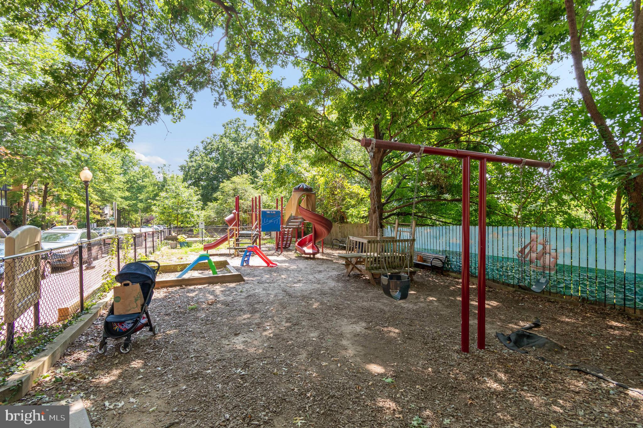 955 26th Street Northwest, Unit 707 Washington, DC 20037 - Photo 18 of 26 a view of outdoor space with seating area and trees around