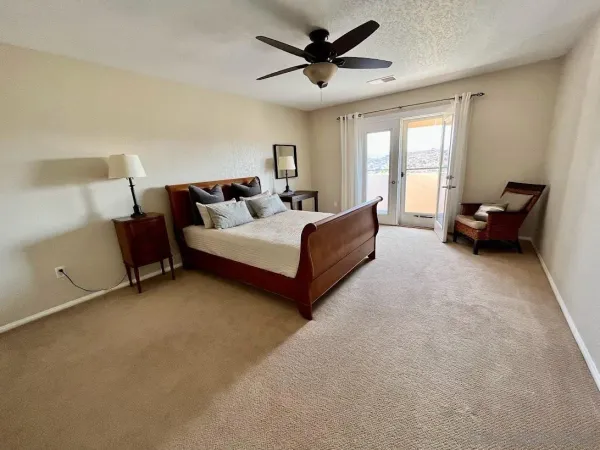 a bed room with a bed and a couch