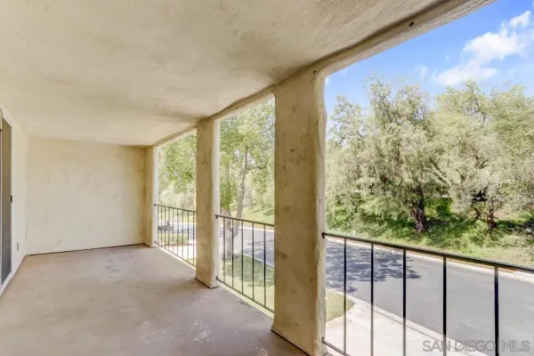 a view of a room with a large window