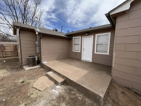 a view of a house with a garage