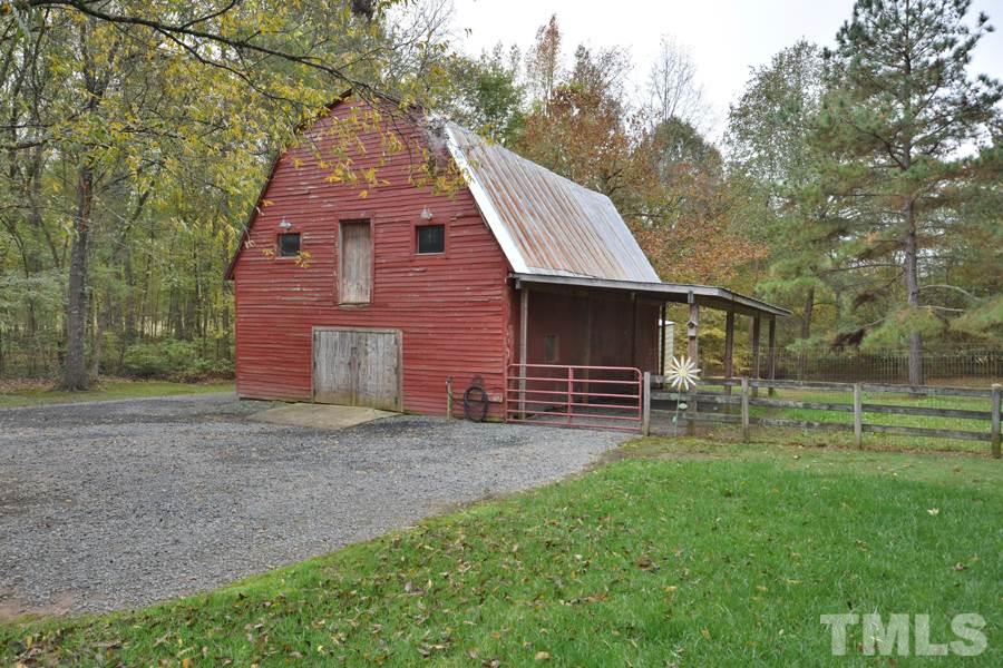2260 Sanders Road Stem, NC 27581 - Photo 27 of 30 a view of a back yard of the house