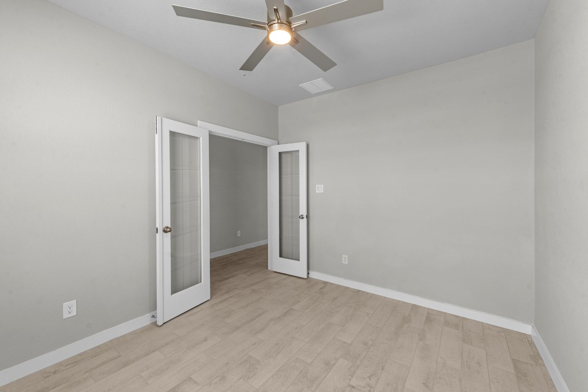 2129 Sunflower View Street Brookshire, TX 77423 - Photo 11 of 29 wooden floor in an empty room